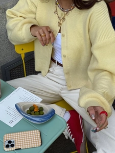 Women's yellow loose knit cardigan with buttons and long sleeves for casual daily wear
