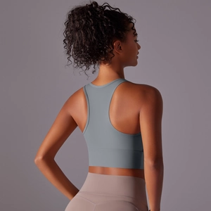Close-up of seamless light grey racerback sports bra with wide support band