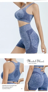Detailed views of blue high-waist yoga shorts and sports bra with breathable mesh texture