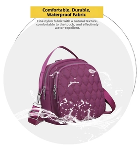 Detail view of waterproof nylon handbag with quilted pattern and water splash effect
