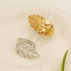 Minimalist PVD plated stainless steel monstera leaf rings in gold and silver finish