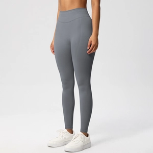 Detail of high-waisted wide waistband on dark grey seamless compression yoga pants