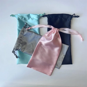 Silk-like satin drawstring storage pouches in blue, black, silver, and pink colors