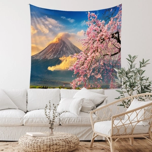 Detail of bohemian tapestry featuring Mount Fuji and cherry blossoms in a living room