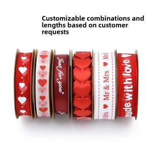 Close-up of six red and white wedding ribbons with heart prints and romantic text