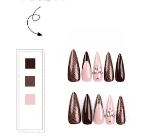 Detail of stiletto press-on nails featuring brown glitter and pink French tips with rhinestones