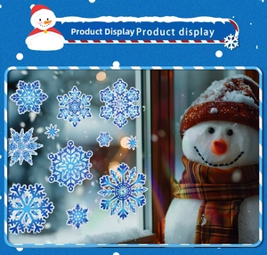 Close-up of holographic blue snowflake window stickers for festive Christmas glass decoration