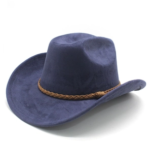 Detail of navy blue suede cowboy hat featuring brown braided leather band and brim texture