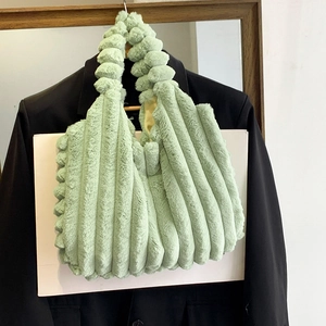 Light green faux fur tote bag with vertical stripes and fluffy texture for autumn winter