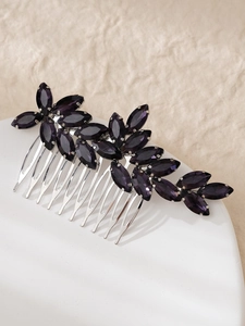 Close-up of purple marquise crystal bridal hair comb with silver floral setting