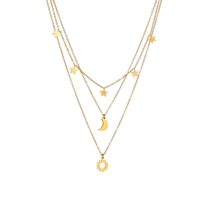 Three-layer gold necklace with moon, star and sun pendants on a clean white background