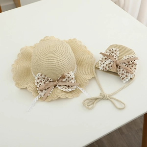 Set cappello di paglia e borsa per bambina con fiocchi floreali e pizzo bianco