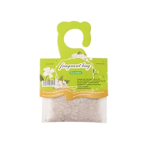 Duftsäckchen mit Lavendelduft in grüner Verpackung mit aromatischen Pflanzenkernen