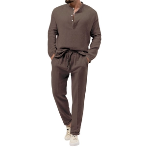 Detail of dark brown men's cotton linen set showing textured fabric and drawstring waist