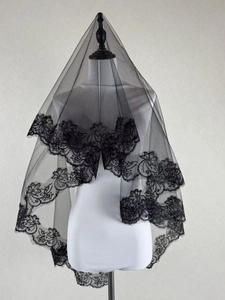 Detailed view of exquisite black lace floral embroidery on a 3-meter bridal wedding veil