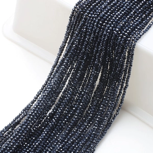 Macro shot of 2mm faceted black glass beads for DIY jewelry and accessories