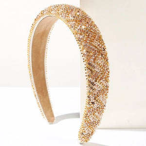 Detailed view of luxury wide headband with hand-stitched gold and silver beads and sequins