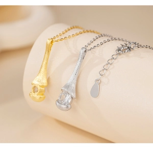 Macro detail of S925 sterling silver necklaces with matte finish and zircon stone