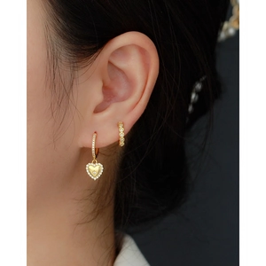Elegant gold heart earrings set featuring sparkling rhinestones and delicate hoop designs