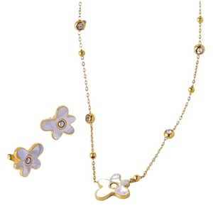 Gold-plated floral jewelry set with white shell petals and pearls on a white background
