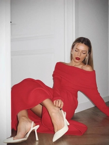 Elegant red off-shoulder knitted long dress paired with white pointed toe high heels