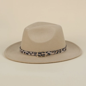 Detail of khaki fedora hat featuring leopard print belt and golden metal buckle