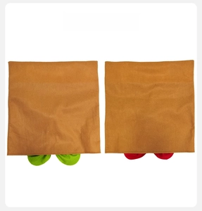 Back view of plush gingerbread man chair covers showing soft brown fabric and festive details