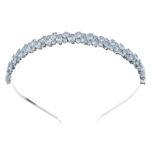 Detailed view of silver hairband with sparkling rhinestones on a white background