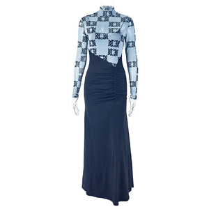 Detail of light blue printed mesh bodice and dark blue slim fit knit dress texture