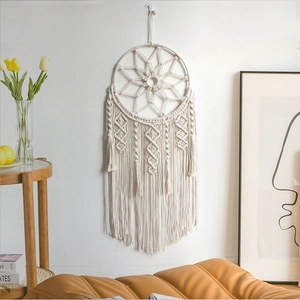 Handmade bohemian dreamcatcher wall hanging with white cotton rope and tassels