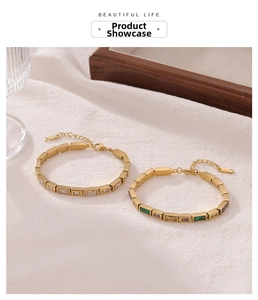 Close-up of gold-plated geometric square links bracelet with colorful cubic zirconia