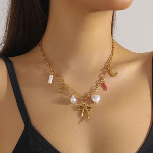 Gold stainless steel necklace featuring star, moon, bow, pearl, and heart charm pendants