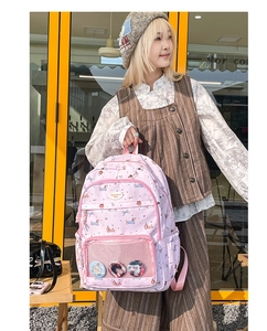Pink dachshund school backpack with clear front compartment for badge display and badges