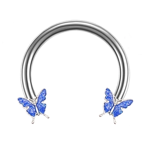 Surgical steel horseshoe piercing ring with blue glitter butterfly accents on white background