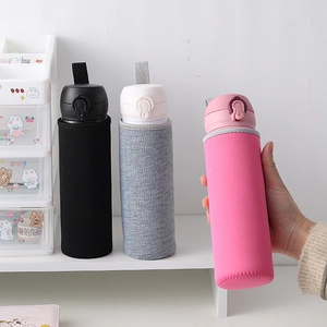 Three colorful insulated bottle sleeves with carry handles in black, grey, and pink