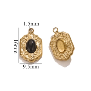 Macro view of vintage 18k gold plated oval pendant with 16mm height and 9.5mm width details