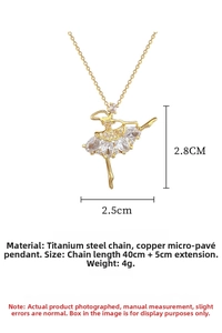 Detail view of gold ballet girl pendant with clear zircons and size annotations
