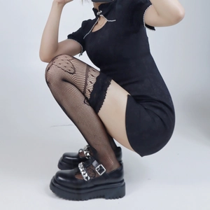 Dark Lolita outfit with black lace fishnet socks and platform Mary Jane shoes