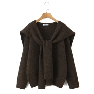 Deep brown knitted sweater set featuring a large lapel collar with scarf tie design