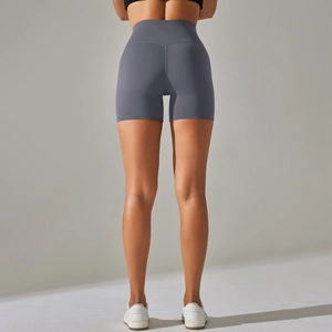 Close-up of high-waisted seamless yoga shorts showing squat-proof fit and lifting effect