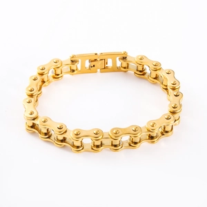 Detail of industrial punk bike chain bracelet for men with polished gold finish