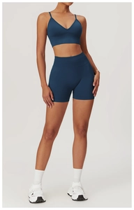 Front view of a dark blue seamless high-waist yoga set with V-neck sports bra and shorts