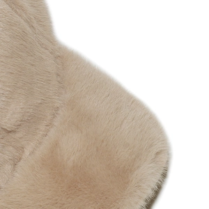 Macro shot of soft beige plush faux mink fur material with smooth and dense texture