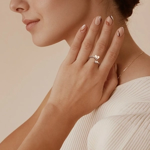 Elegant silver S925 sterling silver open ring featuring a stylish double heart design