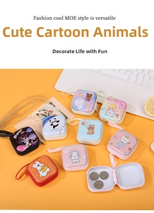 Detailed view of the interior compartment of a mini cartoon tinplate coin purse
