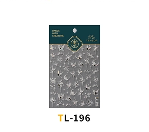 Macro detail of TL-196 nail stickers with silver embossed butterfly and galaxy patterns