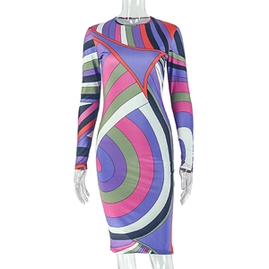 Detail of colorful geometric striped print and elastic knit fabric on long sleeve dress