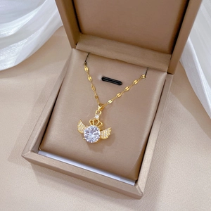 Titanium steel necklace with crystal wing pendant and crown in a beige jewelry box