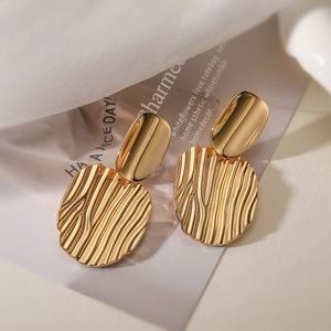 Minimalist gold-plated geometric earrings with oval tops and textured round drops