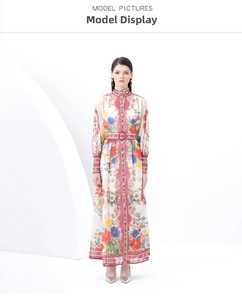 Detail of vintage floral print dress with stand collar and decorative belt buckle